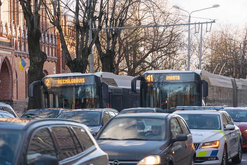 Ensuring Public Transport Priority at Signalized Intersections Using License Plate Recognition and Vehicle Type Classification